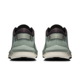 On Cloudzone women's active life shoes in black and white, featuring breathable mesh and cushioned soles for athletic comfort.