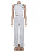 Decorative button smocked back cami and wide-leg pants set by Trendsi, featuring a stylish coordinated outfit with a fitted top and flowy pants.