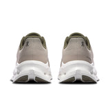 Men's On Cloudtilt active life sneakers in gray with black accents, showing the side view and textured sole.