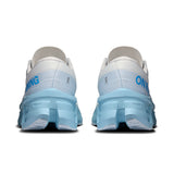 Women's On Cloudmonster 3 road running shoes with breathable mesh upper and cushioned sole, designed for comfort and performance.