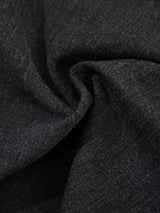 Men's high-waisted pleated wide-leg Capri pants in a lightweight fabric, shown on a model with a neutral background.