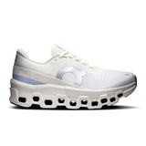 Women's On Cloudmonster 2 road running shoes in classic ivory and Nimbus colors, featuring breathable mesh and cushioned soles.