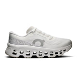 Women's On Cloudmonster 3 road running shoes with cushioned soles and breathable mesh upper, in a sleek design.