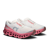 Women's On Cloudmonster 3 road running shoes featuring a sleek design, cushioned soles, and breathable upper for comfort.