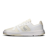 Men's On THE ROGER Clubhouse tennis shoes in black with white accents, featuring breathable mesh and cushioned soles for comfort.