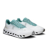 Men's On Cloudtilt active lifestyle shoes in black and gray with cushioned soles and breathable mesh upper.