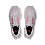 Women's On Cloudmonster 3 road running shoes with breathable mesh and cushioned soles, designed for comfort and performance.