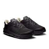 Men's On Cloudzone Moon active life shoes in black and white with cushioned soles and sleek design.