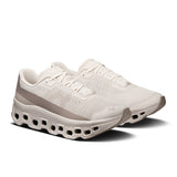 On Cloudmonster Void women's active life shoes in pearl and desert, limited edition with stylish, cushioned design for comfort and performance.