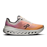 On Cloudsurfer Next women's road running shoes in gray with blue accents, featuring cushioned soles and breathable mesh uppers.