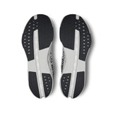On Cloudsurfer Next men's road running shoes in black and white, featuring cushioned sole and lightweight design.