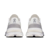 On Cloudpulse Pro women's training shoes in black with white accents, featuring breathable mesh and cushioned soles for comfort.