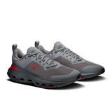 On Cloudpulse Next men's training shoes in black with white accents, featuring breathable mesh upper and cushioned sole.