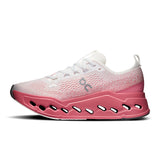 Women’s On Cloudsurfer Max road running shoes in black and white with cushioned soles and breathable mesh upper.