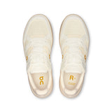On THE ROGER Clubhouse Ace men's tennis shoes with white and blue design, featuring supportive sole and breathable upper material.