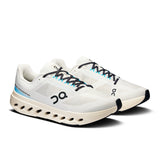 Men's On Cloudsurfer Next road running shoes with lightweight design and cushioning, shown in a dynamic outdoor setting.