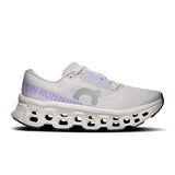 Women's On Cloudmonster 3 road running shoes in black with white accents, featuring a cushioned sole and supportive design.