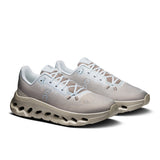 On Cloudtilt women's active life shoes in black and pink, featuring lightweight design and supportive cushioning for active wear.