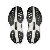 Women's On Cloudboom Max road running shoes with breathable mesh upper and cushioned sole, designed for high-performance running.