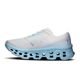 Women's On Cloudmonster 3 road running shoes with lightweight design and cushioned soles, in vibrant color.