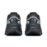 On Cloudflow 5 AD women's running shoes in black with white accents, featuring lightweight design and cloud-inspired cushioning.