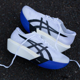 Unisex ASICS Metaspeed Sky Tokyo road racing shoes in white and cobalt burst, designed for speed and lightweight performance.