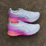 Women's ASICS GEL-Kayano 32 stability trainers in sunny Sizzle color with breathable mesh and supportive design for running comfort.