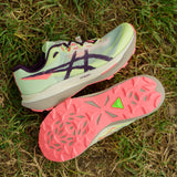 Unisex ASICS Fujispeed 4 trail running shoes with breathable mesh upper and rugged outsole for outdoor running.
