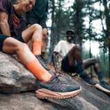 Women's ASICS Blazeblast trail running shoes in vibrant colors with breathable mesh uppers and durable rubber outsoles.