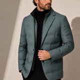 Men's lightweight quilted puffer jacket by Zexov, showing the jacket's slim fit and quilted design in a neutral color.