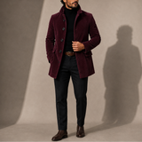 Men’s tailored winter coat with stand collar by Zexov, showcasing a sleek, dark-colored design suitable for cold weather.