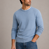 Men’s crew neck fine knit sweater by Zexov, showing a close-up of the soft, textured fabric and classic fit in neutral color.