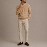 Men’s V-neck sweater by Zexov, classic knit long-sleeve pullover in a neutral color, shown hanging on a wooden hanger.