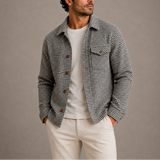 Men’s Houndstooth shirt jacket by Zexov featuring a classic black and white houndstooth pattern and button-front design.