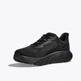 Women's Hoka Arahi 7 running shoes in black with B-width, featuring a sleek design and cushioned outsole.