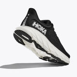 Women's Hoka Arahi 7 running shoes in black and white with B-width, featuring a lightweight, supportive design and cushioned sole.