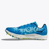 Hoka Crescendo XC trail running shoes in black with orange accents, featuring durable mesh uppers and rugged outsoles.