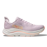 Women's Hoka Clifton 10 running shoes in lilac, cream, and tangerine glow, featuring a comfortable B-width design.