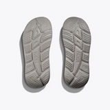 Hoka Ora Recovery Slide 3 shoes in Alabaster and Stardust with white straps and cushioned footbed.