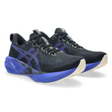 Men's ASICS Novablast 5 neutral daily trainers in black and cobalt with breathable mesh upper and cushioned sole.