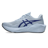 Men's ASICS Novablast 6 Wide neutral daily trainers with solid air cushion in Prussian Blue, showcasing the shoe's front and side view.