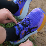 Men's ASICS Trabuco Max 5 trail running shoes in cobalt burst and black, featuring durable outsole and breathable mesh upper.