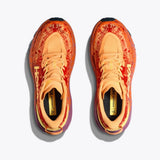 Hoka Women's Speedgoat 6 trail running shoes in Sherbert Beetroot color, with breathable mesh and durable rubber outsole.
