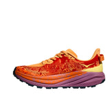 Women's Hoka Speedgoat 6 wide trail running shoes in Sherbert and Beetroot colors with breathable mesh uppers and rugged outsoles.
