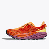 Women's Hoka Speedgoat 6 shoes in Sherbert Beetroot color, featuring breathable upper and rugged trail outsole.