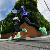 Unisex ASICS Magic Speed 5 tempo trainers in Vital Green and Carrier Grey with breathable mesh upper and cushioned sole.