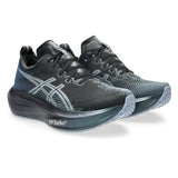 Unisex ASICS Megablast tempo trainers in black and white with breathable mesh uppers and cushioned soles.