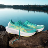 Unisex ASICS Megablast tempo trainers in energy aqua blue fade, showing lightweight mesh uppers and cushioned soles.