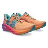Unisex ASICS Novablast 5 LA neutral daily trainers in Mojave and Amethyst with breathable mesh upper and cushioned sole.