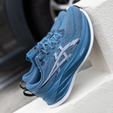 Unisex ASICS Superblast 2 winter sea white tempo trainers with white and blue accents on a plain background.